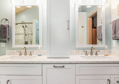 New Bathroom Vanities and sinks with mirrors and new hardware and granite countertops