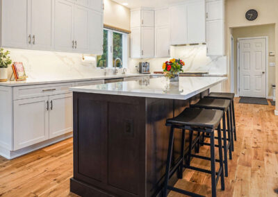 Beautiful Kitchen Island with Stool Seating shown after design renovations