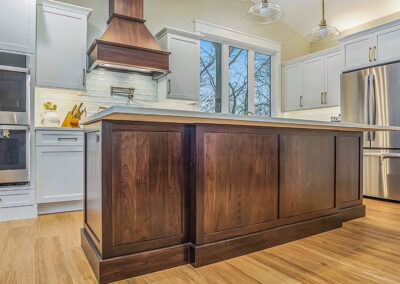 Kitchen Island and Flooring showing stools and wood sides
