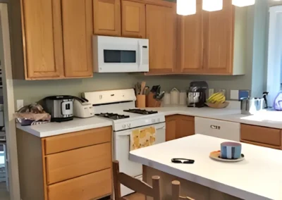 Old kitchen layout showing cooking range and microwave