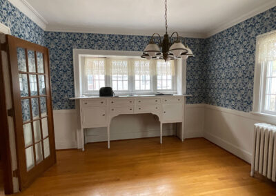 Wide view of old kitchen area before renovation and redesign