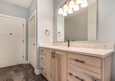 Lower Bath with New Cabinetry and Sink Vanity